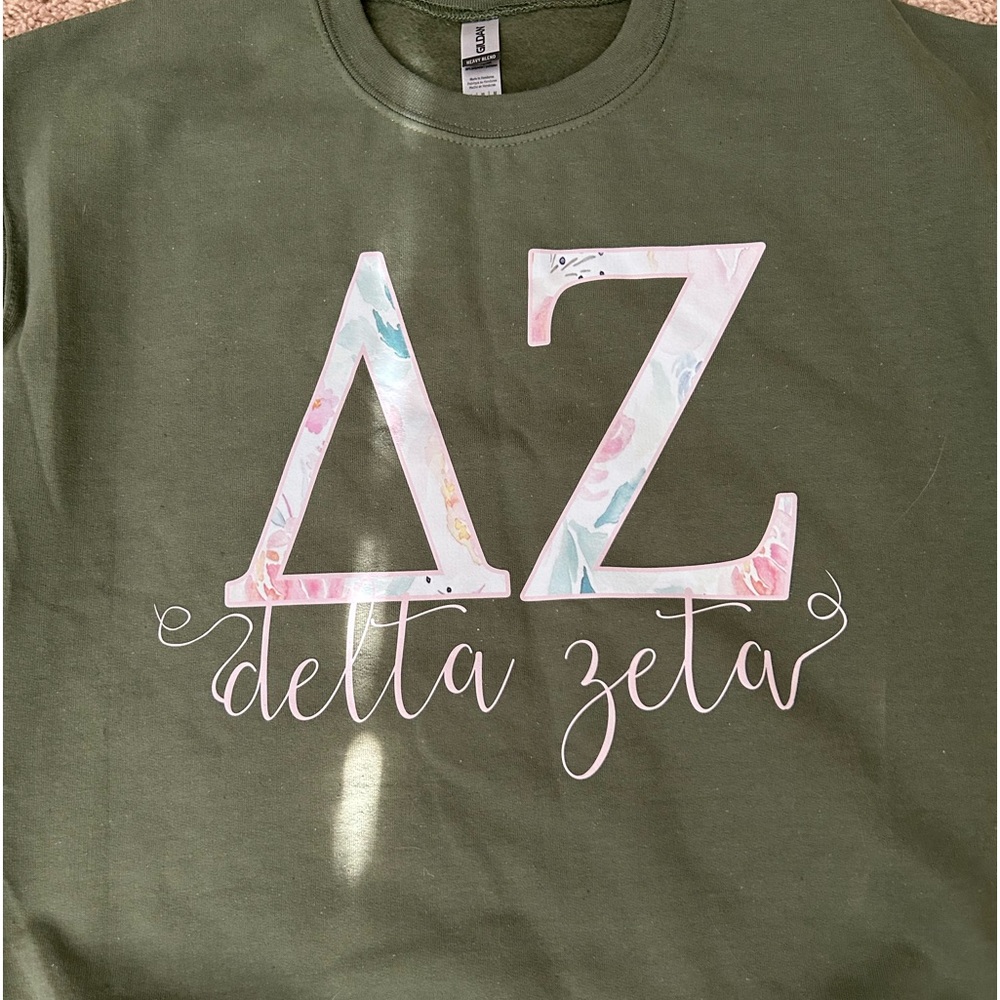 Brand new Delta Zeta sorority sweatshirt! Super soft and cute green color